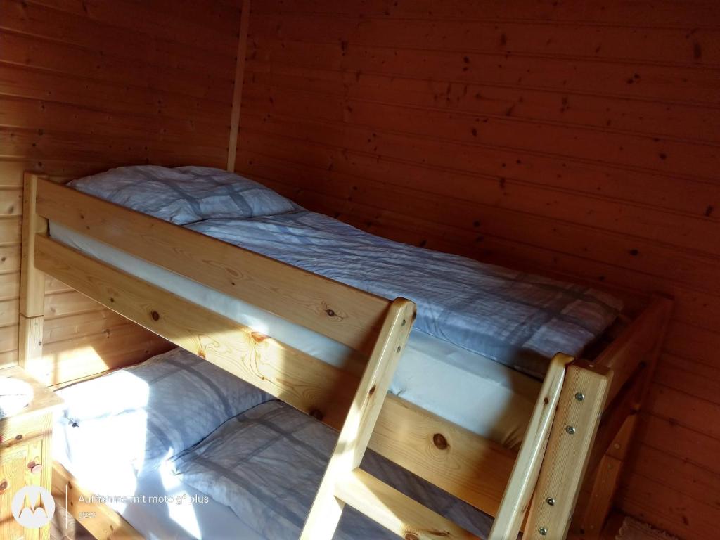 Postel nebo postele na pokoji v ubytování Rauter in Wöllan