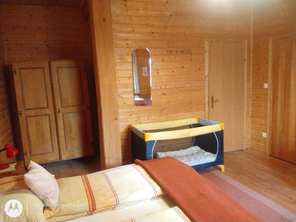 Postel nebo postele na pokoji v ubytování Rauter in Wöllan