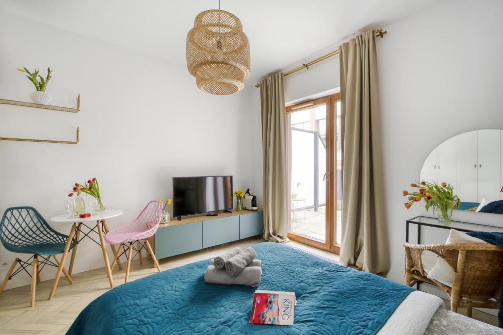 Posteľ alebo postele v izbe v ubytovaní Aparthotel Pawia Deluxe