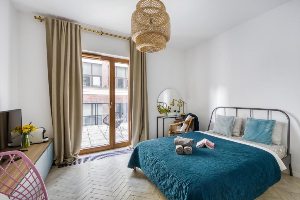Posteľ alebo postele v izbe v ubytovaní Aparthotel Pawia Deluxe
