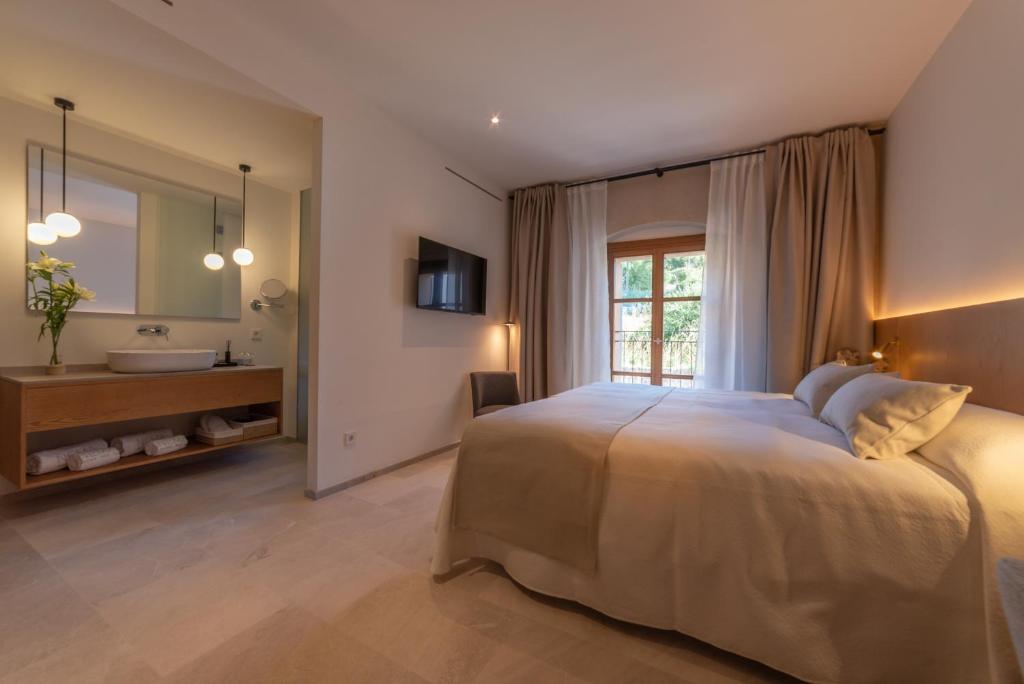 Postel nebo postele na pokoji v ubytování Nema Boutique Hotel & Spa