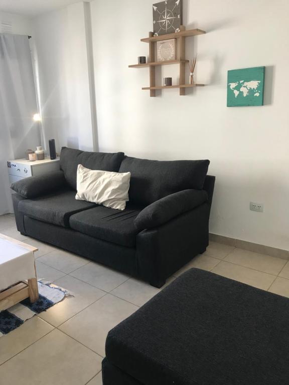 Et opholdsområde på Depto Barrio Universitaro III , wifi,cochera, checkin express