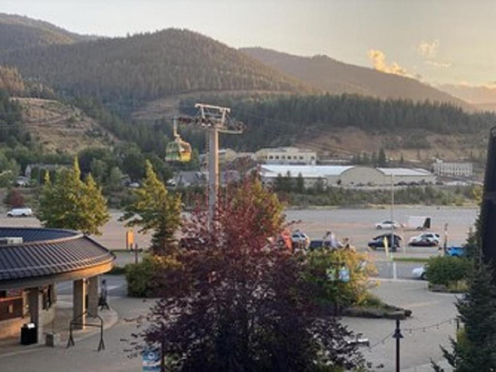 arial view of a parking lot with a ski lift at Morning Star Lodge - Hosted by Linda in Kellogg