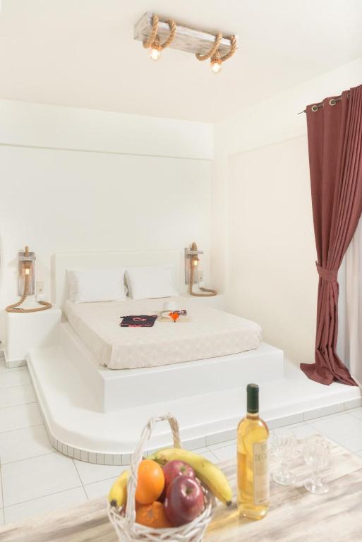 Postel nebo postele na pokoji v ubytování Hotel Sunshine Matala