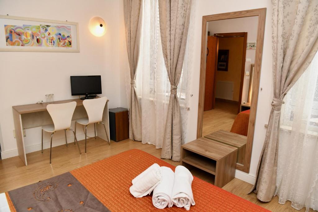 TV a/nebo společenská místnost v ubytování Hotel Anacapri