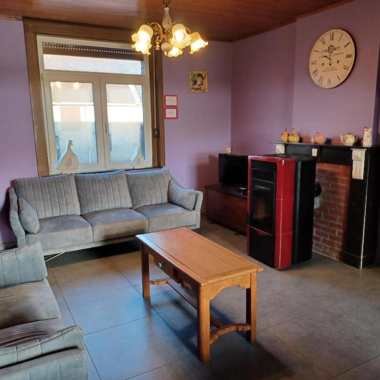 Posezení v ubytování Gite Au Cortil