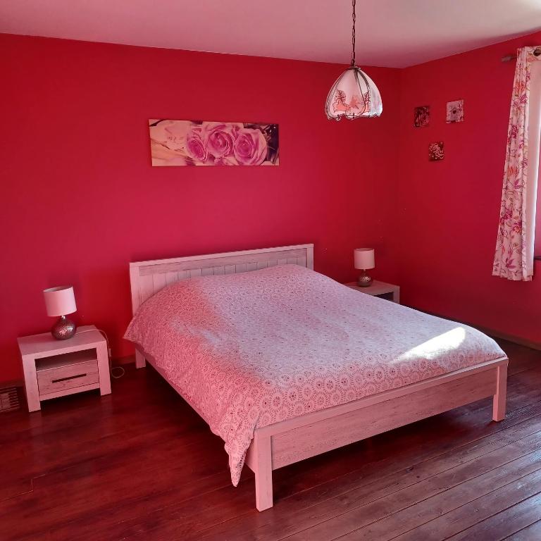 Postel nebo postele na pokoji v ubytování Gite Au Cortil