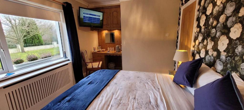 Postel nebo postele na pokoji v ubytování The Yoke B&B and Self-Catering Accommodation Laois