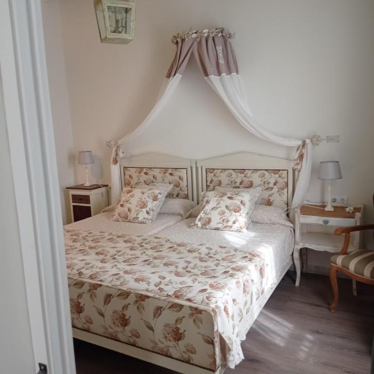 Cama o camas de una habitación en Finca La Favorita- Suites