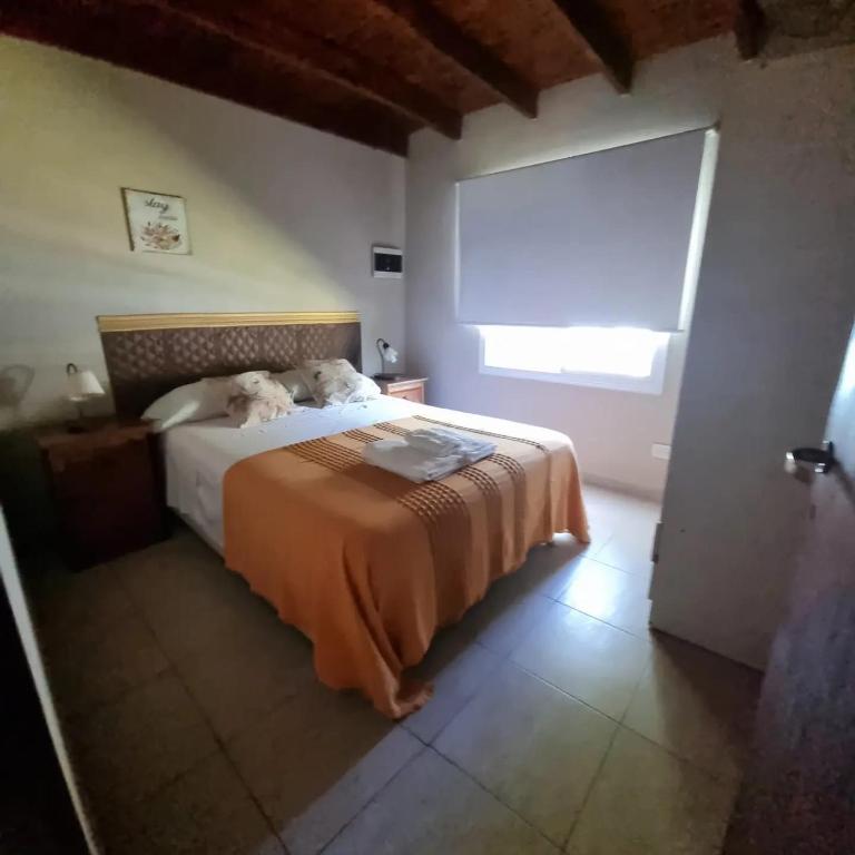 Postel nebo postele na pokoji v ubytování Los manzanos .
