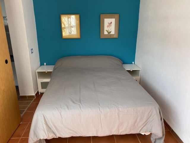 Posteľ alebo postele v izbe v ubytovaní Casita para 2 personas piscina privada playa