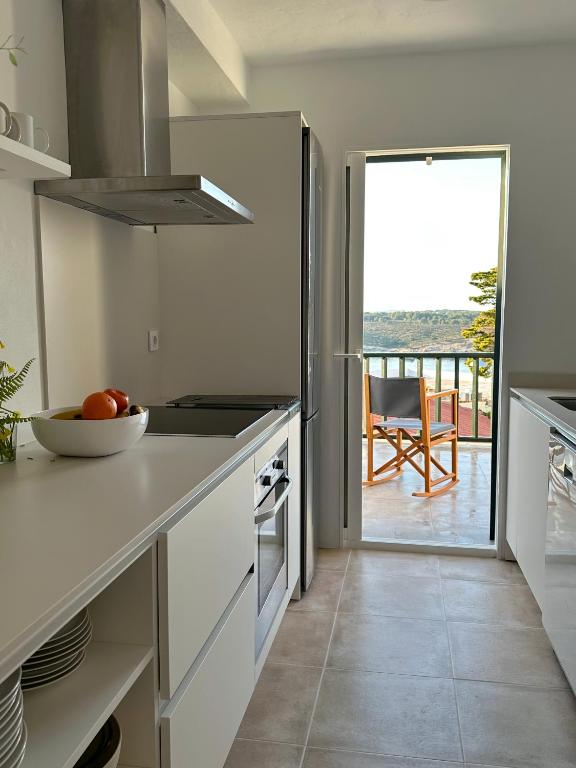 Kuchyň nebo kuchyňský kout v ubytování Duplex Son Parc Best Sea Views