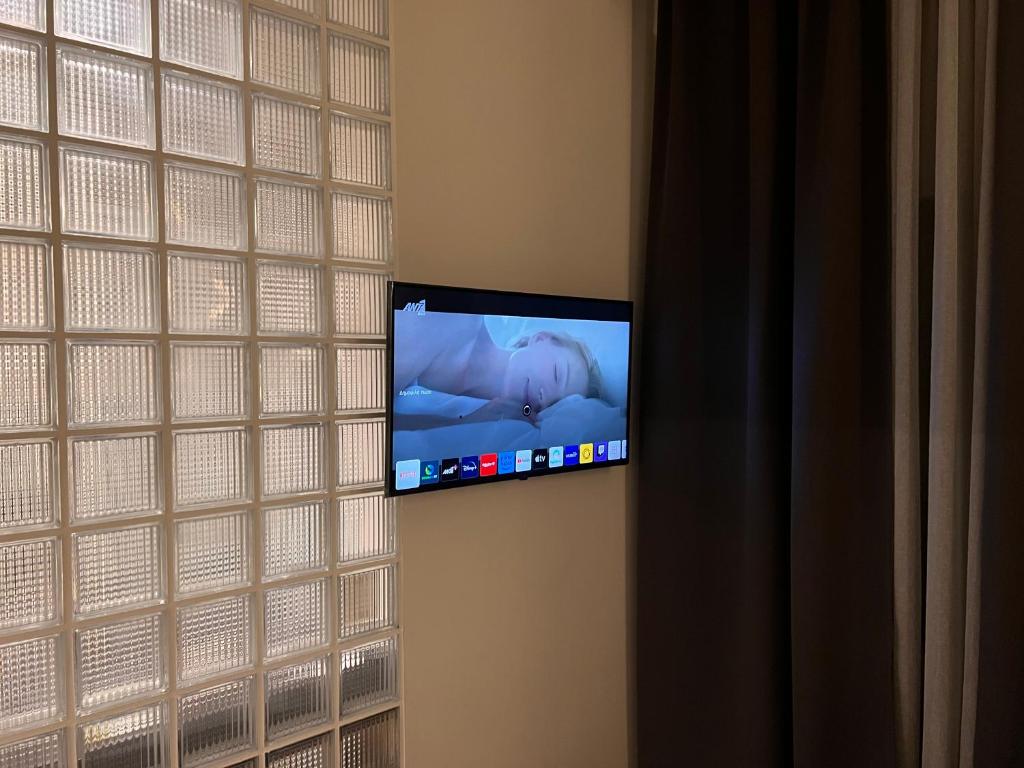 Telewizja i/lub zestaw kina domowego w obiekcie ROOM 11 Aristotelous Thessaloniki and-Mykonos