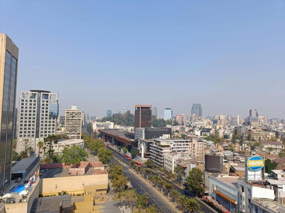 a view of a city with buildings and a street at Apartamento en las alturas, santiago! in Santiago