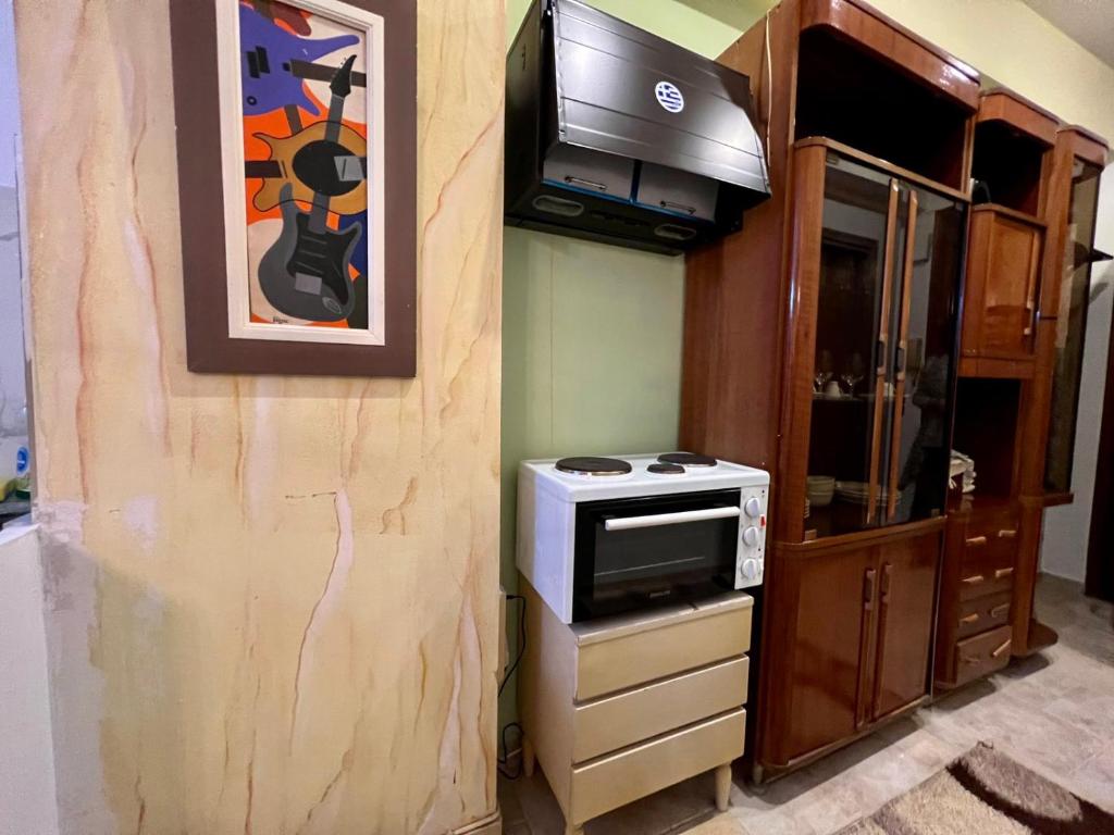 Kuchnia lub aneks kuchenny w obiekcie Όμορφο Κατάλυμα στην Άνω Πόλη Πάτρας