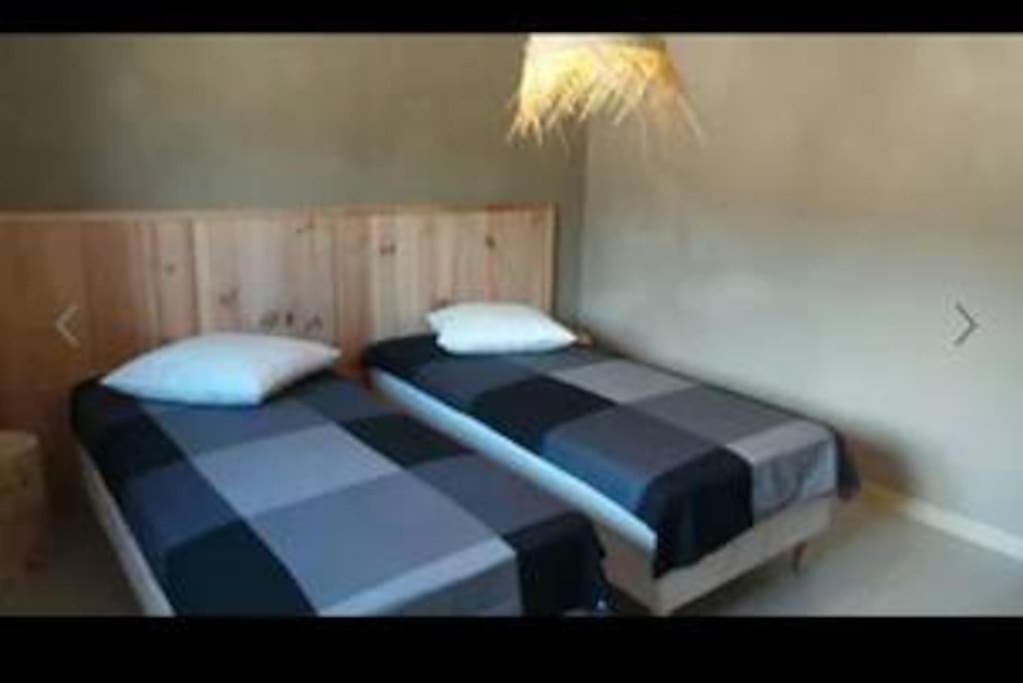 Posteľ alebo postele v izbe v ubytovaní Maison CALM2