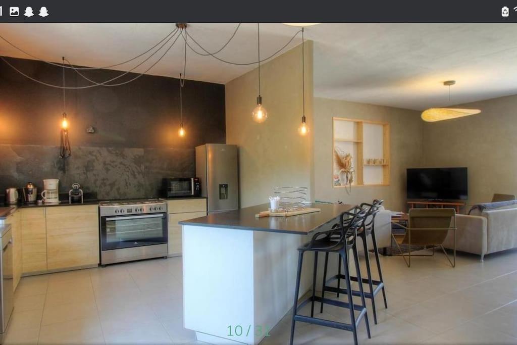 Kuchyňa alebo kuchynka v ubytovaní Maison CALM2