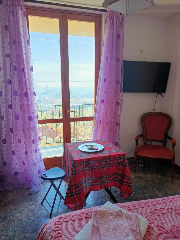 Televízia a/alebo spoločenská miestnosť v ubytovaní B&B VILLA CATERINA