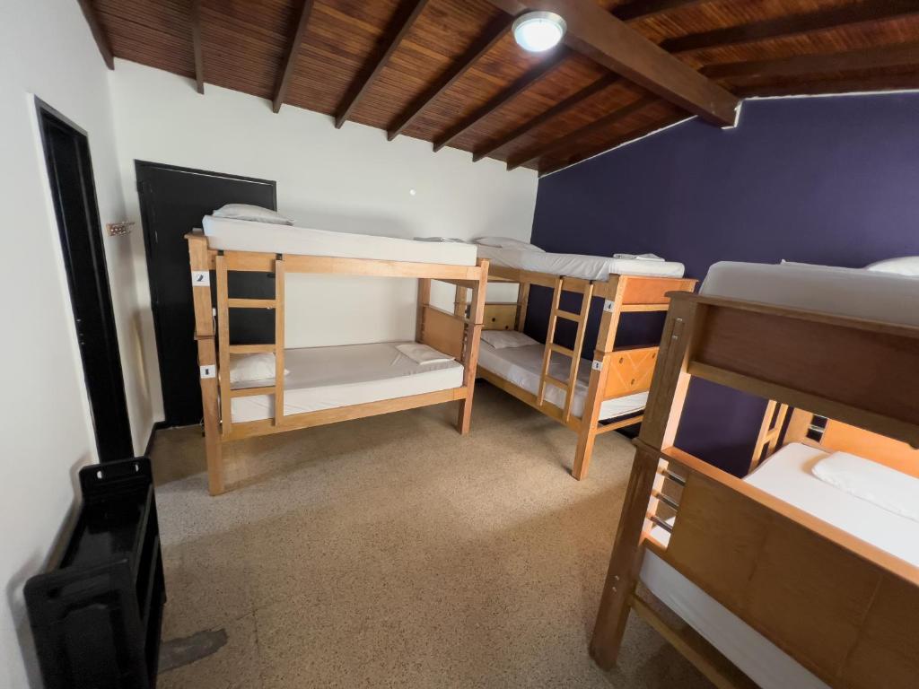 Postel nebo postele na pokoji v ubytování Rock Hostel Medellin