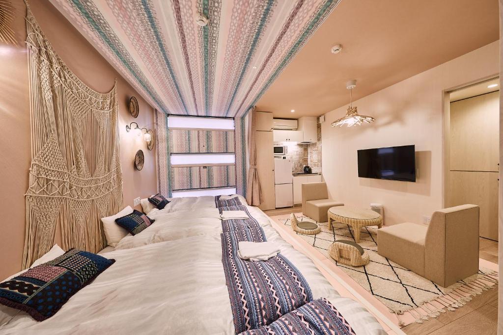 TV a/nebo společenská místnost v ubytování Hotel TORACO konohana