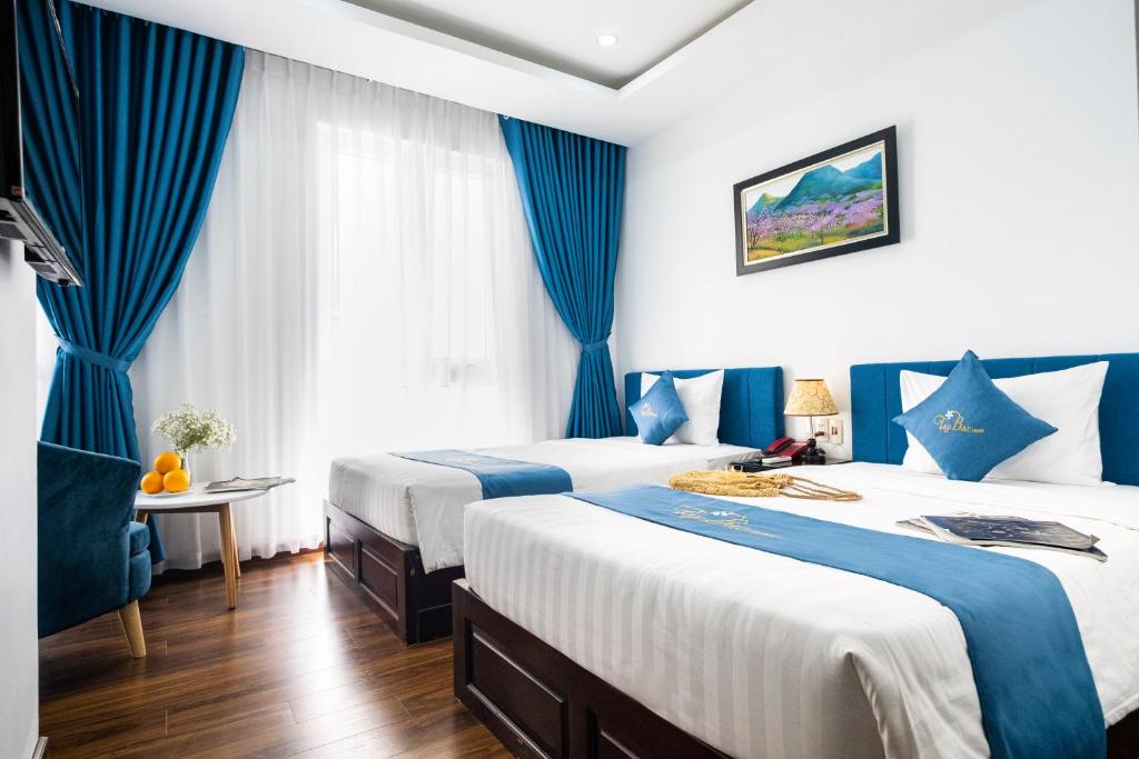 Postel nebo postele na pokoji v ubytování Tay Bac Hotel Da Nang