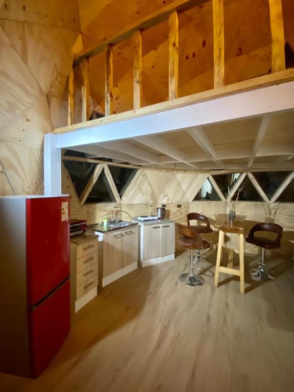 Kuchyň nebo kuchyňský kout v ubytování Cabañas Lihuén SPA