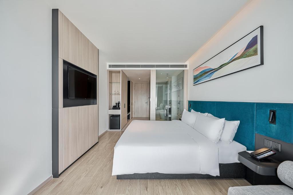 Giường trong phòng chung tại December Hotel