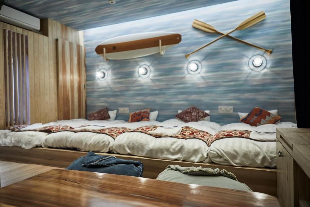 Postel nebo postele na pokoji v ubytování Hotel TORACO konohana