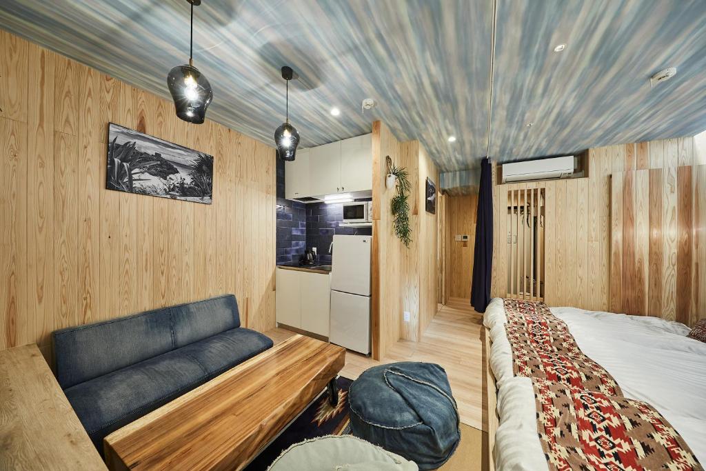 Postel nebo postele na pokoji v ubytování Hotel TORACO konohana