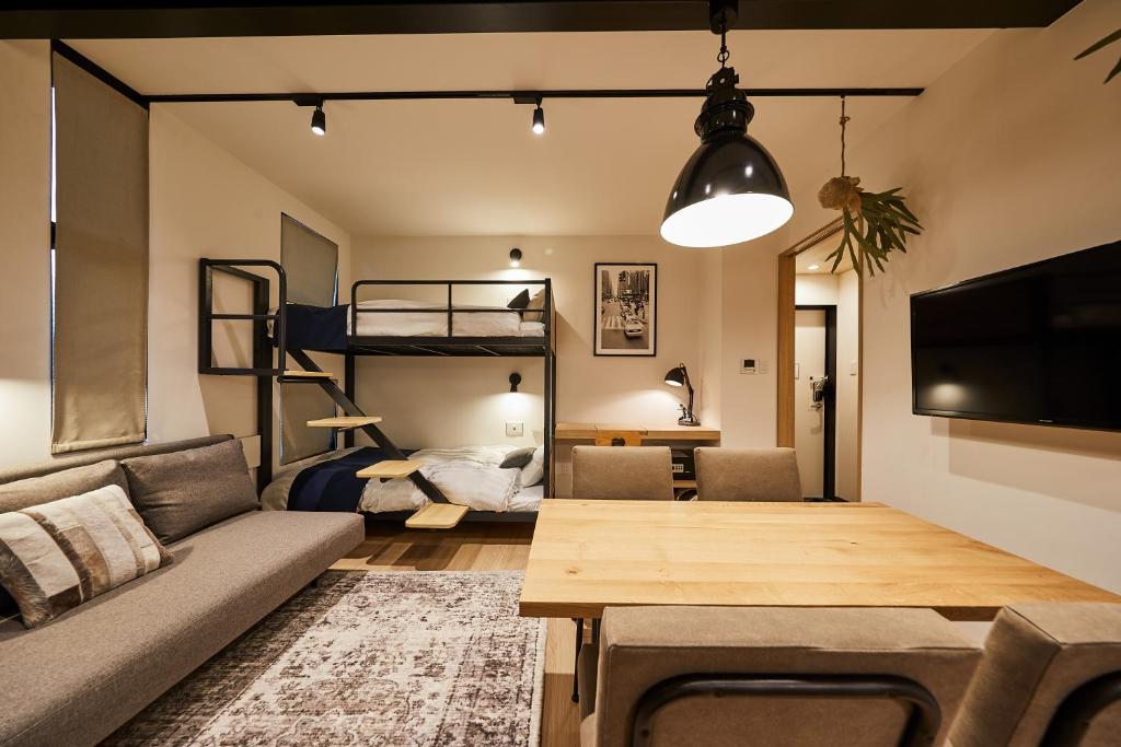 Postel nebo postele na pokoji v ubytování Hotel TORACO konohana