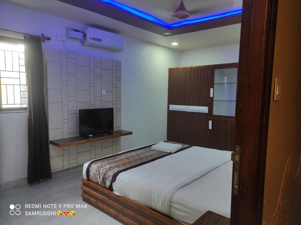 Postel nebo postele na pokoji v ubytování Hotel Calangute Central