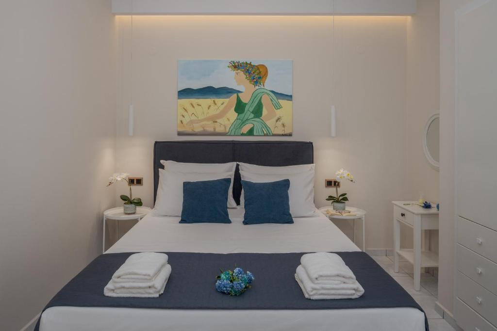 Postel nebo postele na pokoji v ubytování Myra Mare Suites by Estia