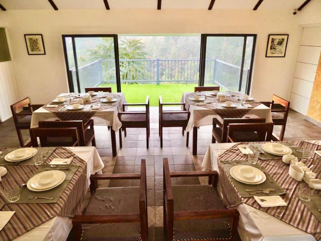 Fotografie z fotogalerie ubytování PEKOE Plantation Cottages by LexStays v destinaci Pīrmed