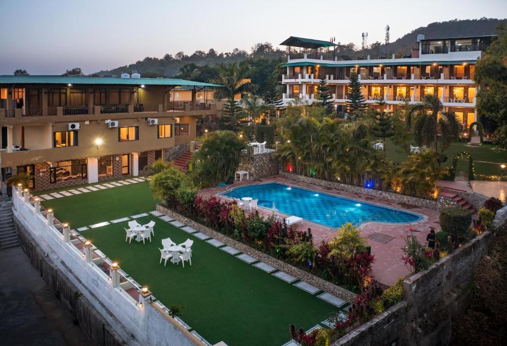 an aerial view of a resort with a swimming pool at Dee Fellows Riverside Resort in Garjia