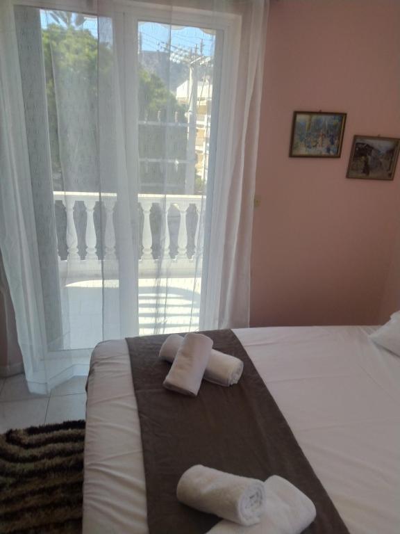 Postel nebo postele na pokoji v ubytování Anestis Apartment