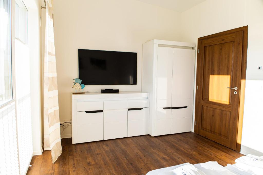 TV a/nebo společenská místnost v ubytování Baltic Village