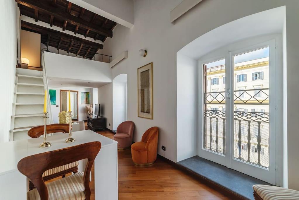 A seating area at HospitalityRome Piazza di Spagna View