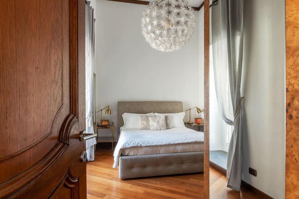 A bed or beds in a room at HospitalityRome Piazza di Spagna View