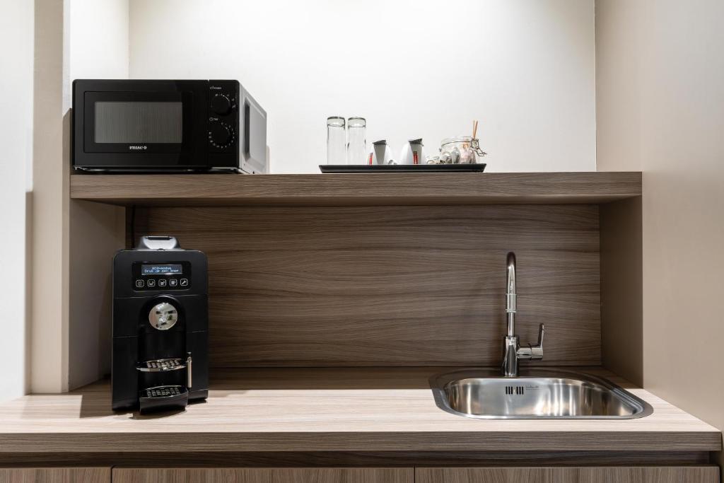 Kuchyň nebo kuchyňský kout v ubytování Hotel Stayen