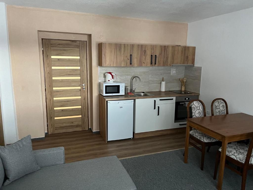 Cucina o angolo cottura di A&A Apartmany