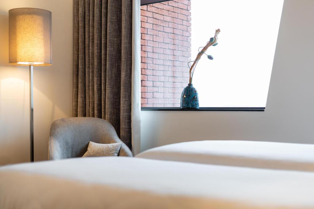 Postel nebo postele na pokoji v ubytování Hotel Stayen