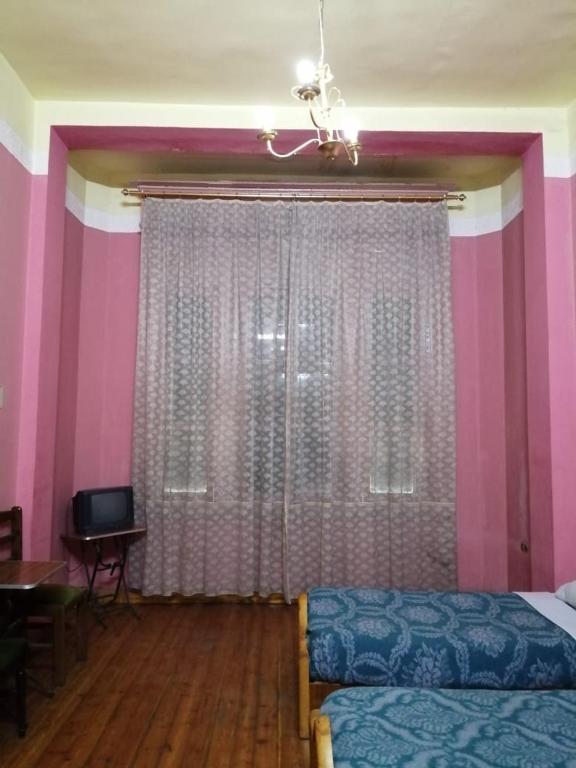 Postel nebo postele na pokoji v ubytování Berlin Hotel
