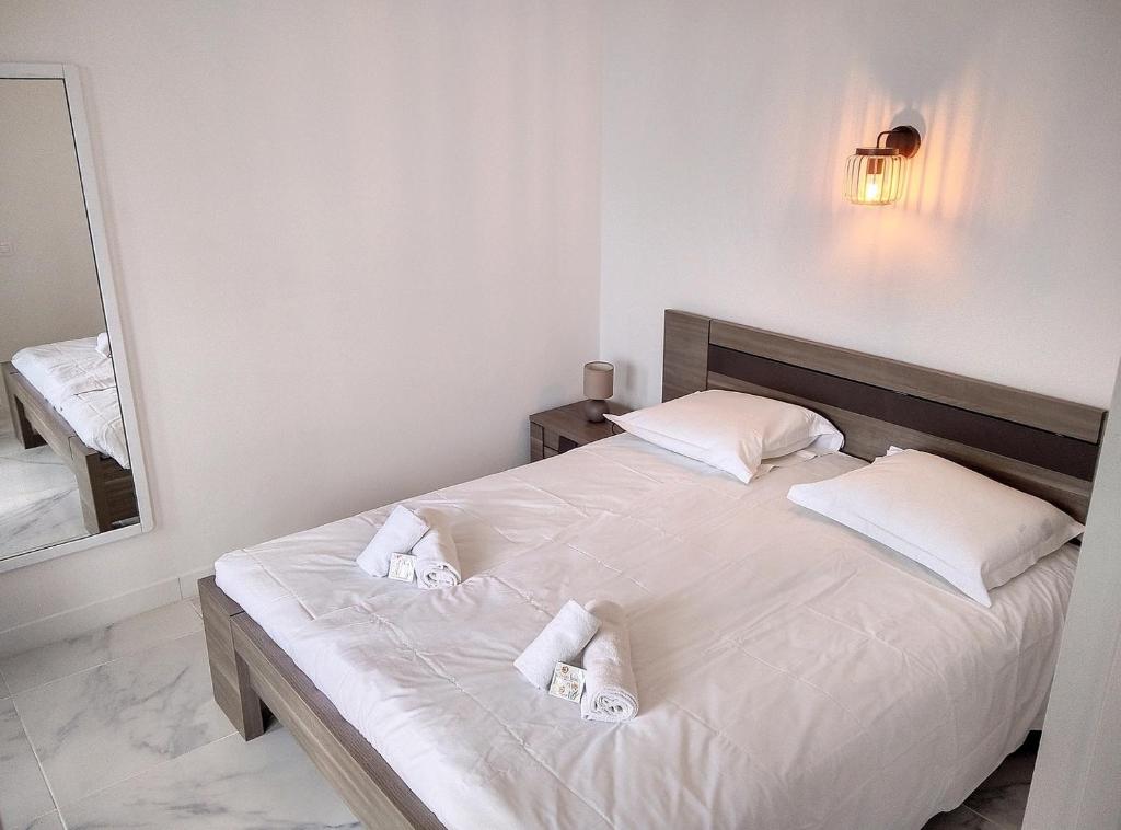 Posteľ alebo postele v izbe v ubytovaní Résidence Graziella Appartement 422
