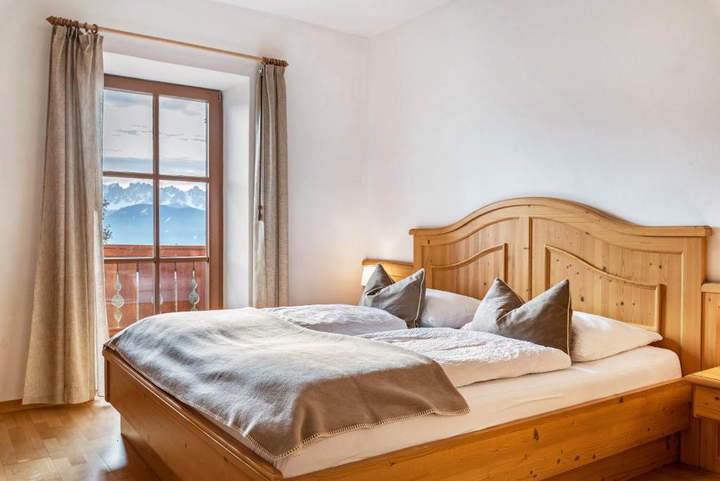 Postel nebo postele na pokoji v ubytování Alpin Farm Birke - Oberweidacherhof