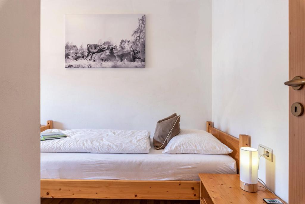 Postel nebo postele na pokoji v ubytování Alpin Farm Birke - Oberweidacherhof