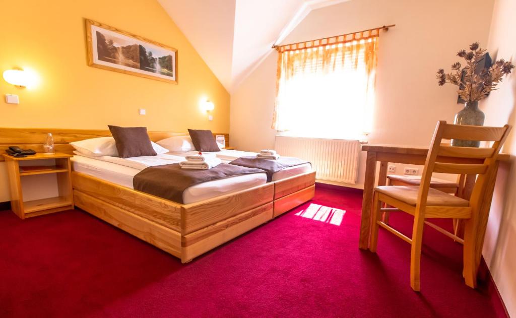 Voodi või voodid majutusasutuse B&B Bau toas