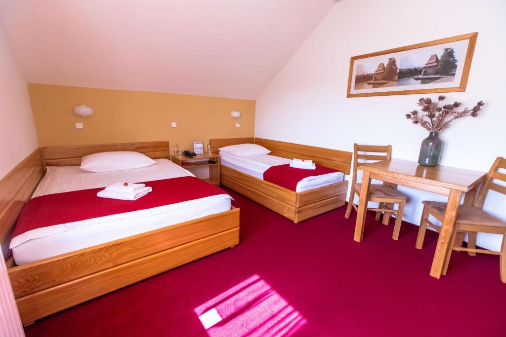 Voodi või voodid majutusasutuse B&B Bau toas