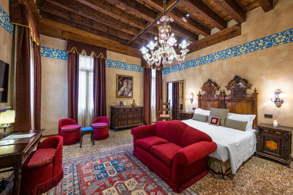 Postel nebo postele na pokoji v ubytování Hotel Palazzo Priuli