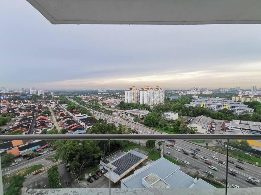 a view of a city with a parking lot at Platino, beside Paradigm Shopping Mall, free wi-fi, 4 bedrooms & 3 toilets, up to 12pax in Johor Bahru
