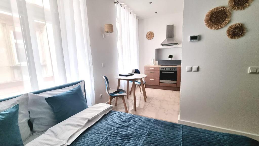Kuchyňa alebo kuchynka v ubytovaní NOOK NOOK Apartments Katarzyny 2